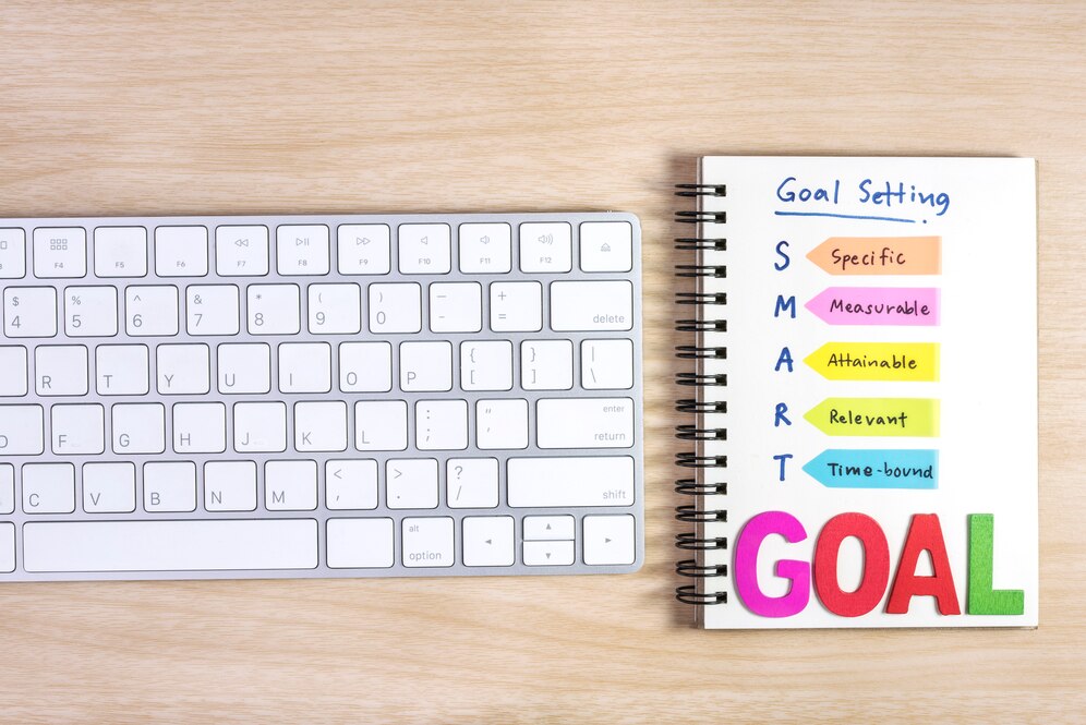 smart-goals-setting-written-notebook_1357-130